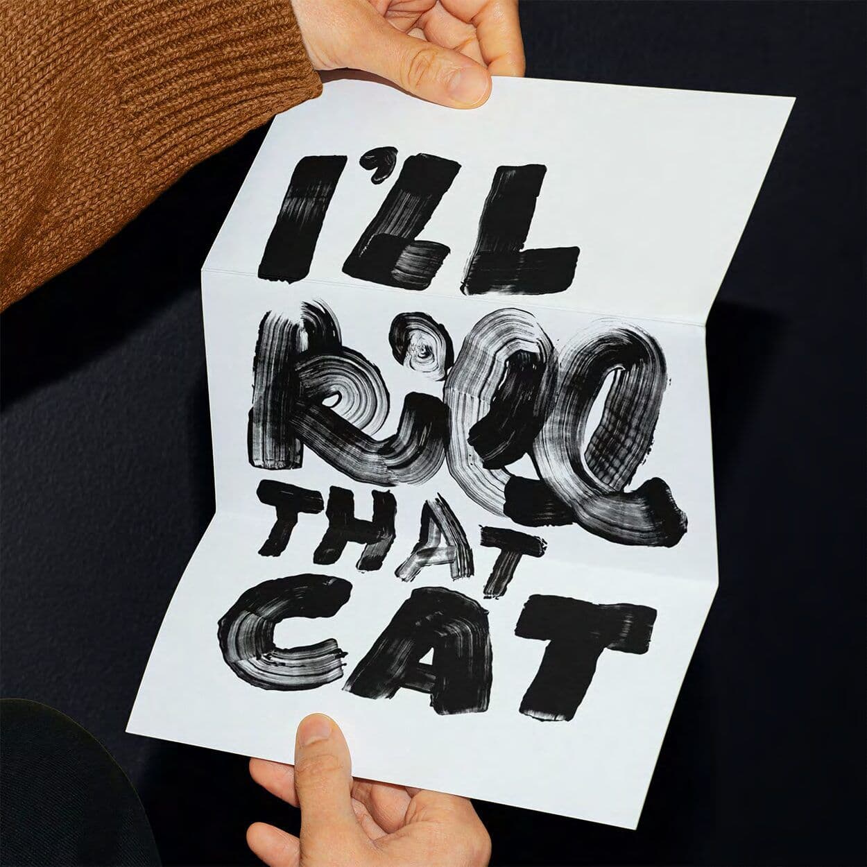 Pinsel-Lettering „I'll kill that cat“ auf Papier